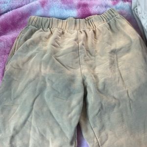 - Grey and peach tye dye brandy melville sweatpants.